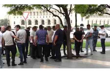 Armenian freight carriers protest outside government building